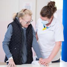 Woman has her hand rehab in hospital