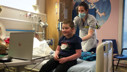 A physiotherapy student with a young patient at Glasgow's Children's Hospital